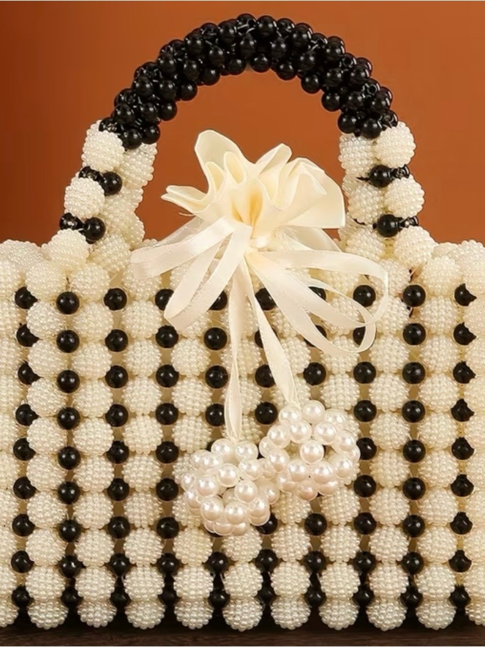 Pearl Beaded Handbag with Black Accent Handle - Elegant Evening Tote